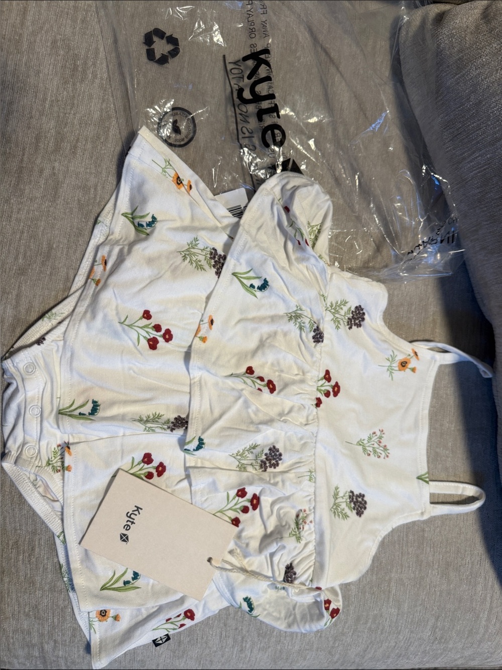 Kyte BABY Spaghetti Strap Ruffle Romper in Wildflower 12-18M